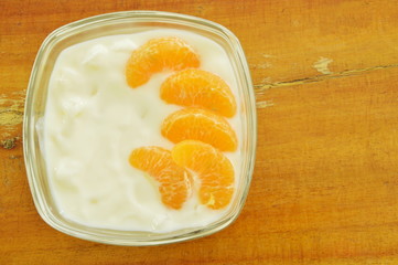 yogurt topping orange in glass cup 