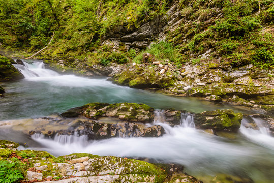 Mountain river Radovna in the Vintgar gorge, a natural Triglav national Park, Slovenia. "Frozen water" - shooting water on a long exposure.