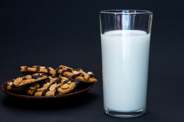 Composition with milk and biscuits. Low key.