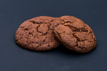 Two chocolate gingerbread. Gingerbread cookies close-up.