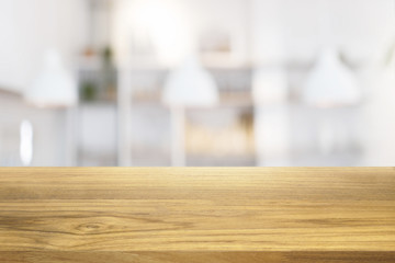 Beautiful empty wooden table and white modern kitchen cafe background