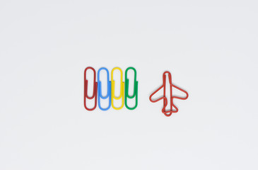 Business concept of difference employee for group of colorful paperclip and another difference red plane paperclip