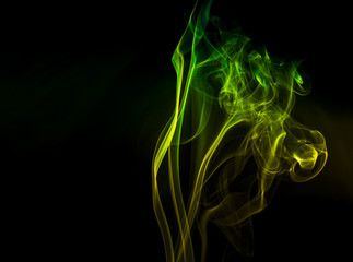 Colored smoke on black background