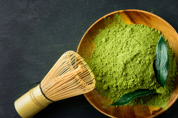 Japanese green tea matcha in a wooden bowl