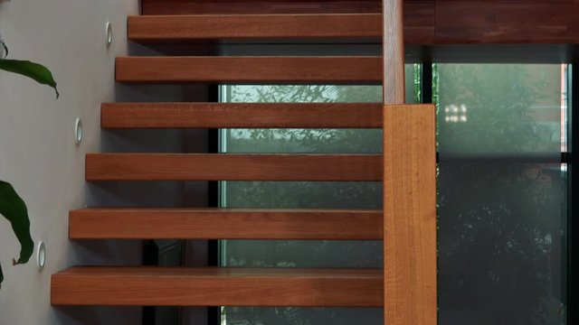 Closeup on wooden stairs in a luxurious house