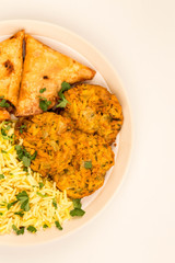 Onion Bhajis And Samosas With Pilau Rice