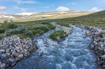 Mountains and river in Jotunheimen National Park, Norway