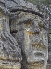 Obraz premium big face devils head sculpted in 19th century by Vaclav Levy to the sand stone rock in Zelizy, czech republic
