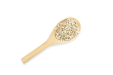 Organic millet seed on wooden spoon isolated on white background,top view