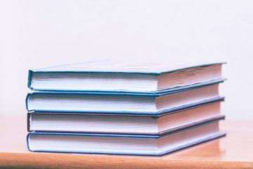 Pile of books on a light background