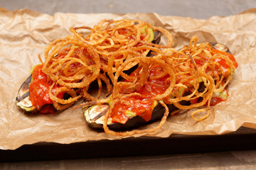 Grilled eggplants with fried onion and sauces