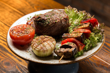 Tasty meat steak with vegetables