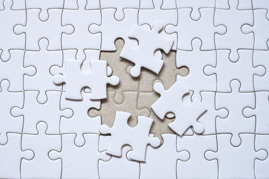 Jigsaw puzzle with one missing piece left to complete, copy space