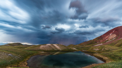 View of Tulpar Kul lake in Kyrgyzstan during the storm