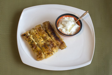 Banitsa  (pie) with cheese with yoghurt - a typical breakfast on the Balkans.