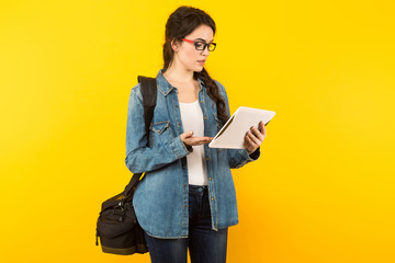 Young woman with bag and pc