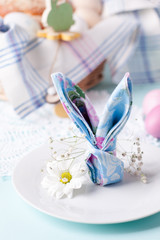 napkin in the form of a rabbit - elements of the Easter festive table, option of serving