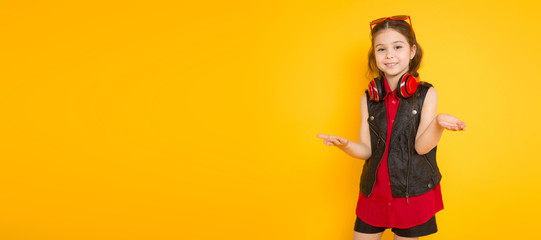 Little girl in headphones