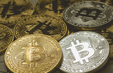 Close Up Golden and silver Bitcoin, Selective Focused on jigsaw ground. Electronic Money And Finance Concept.