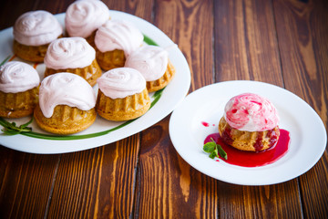sweet muffins with berry cream