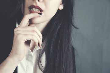 woman hand in lip