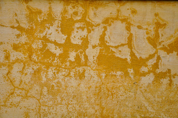 Vintage wall background in yellow and white colors