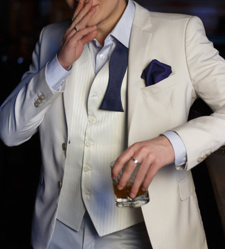 Torso Of A Man In A White Suit