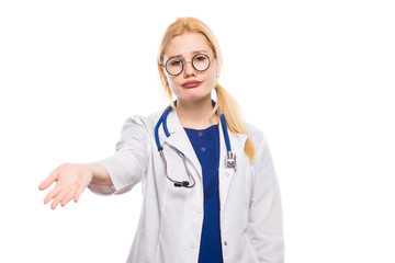 Woman doctor in white coat shows her palm