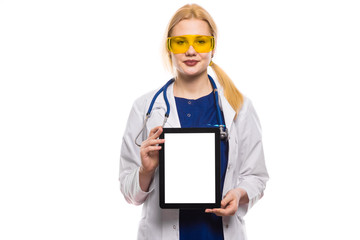 Woman doctor in white coat with tablet