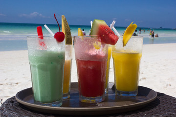 fruit cocktails on the beach of the island Borakay, Philippines
