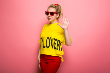 Blonde woman in bright clothes