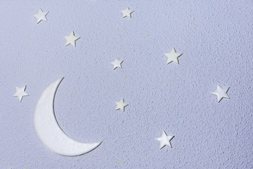 moon with stars on violet rugged background
