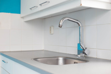 Modern empty new kitchen sink with silver tap