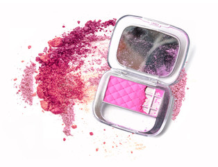 Pink powder cosmetic box with mirror. Crushed make up powder.