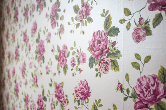 Pink flowers wallpaper on wall background vintage design