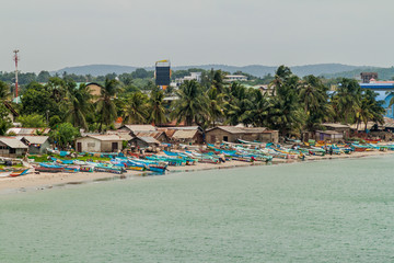 TRINCOMALEE, SRI LANKA - JULY 23, 2016: Boats on a sea coast in Trincomalee, Sri Lanka