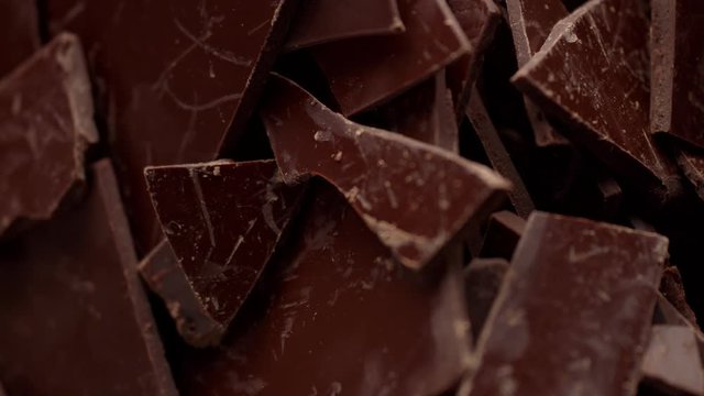 a lot of chocolate sheets breaking and moving. Macro chocolate texture