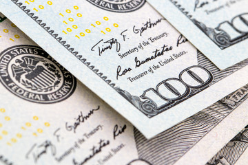 close-up 100 US dollar bills  background toned