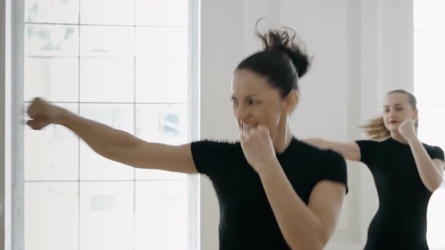 group of girls are engaged in taibo. healthy and sport lifestyle concept