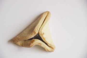 Fototapeta premium traditional purim triangular pastry stuffed with figs