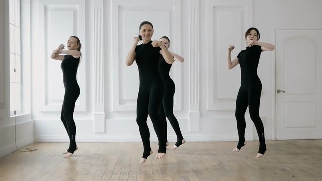 group of girls are engaged in taibo. healthy and sport lifestyle concept