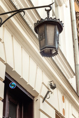 Fototapeta na wymiar Old fashioned vintage street lamp in Krakow, Poland