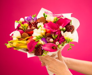 Flowers, fruit bouquet, pink callas, garnet, lychees, freesia, pitahaya