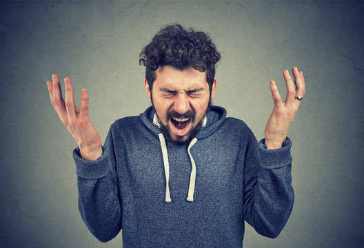 Screaming young man in anger