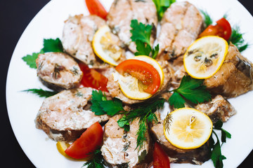 Baked salmon fish fillet with tomatoes, mushrooms and spices. Diet menu. Top view. Flat lay