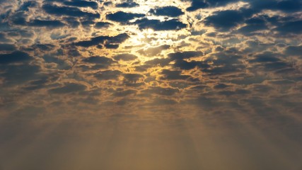 background of sun on the clouy dark sky