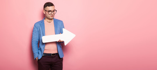 Handsome man in bright jacket with speech pointer