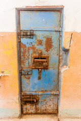 Rusty door in an old prison