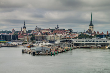 Naklejka premium Ferry harbor and a skyline of Tallinn, Estonia
