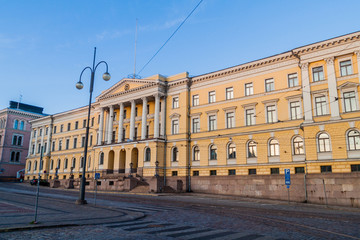 Fototapeta na wymiar Yellow colored columned Government Palace on the Senate Square in Helsinki